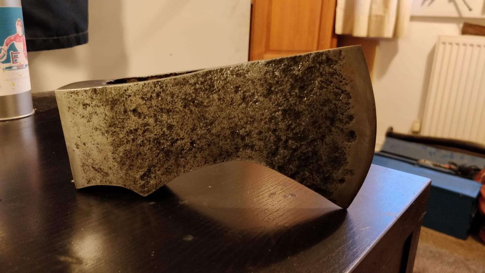 a photo of a slightly less ugly axe head