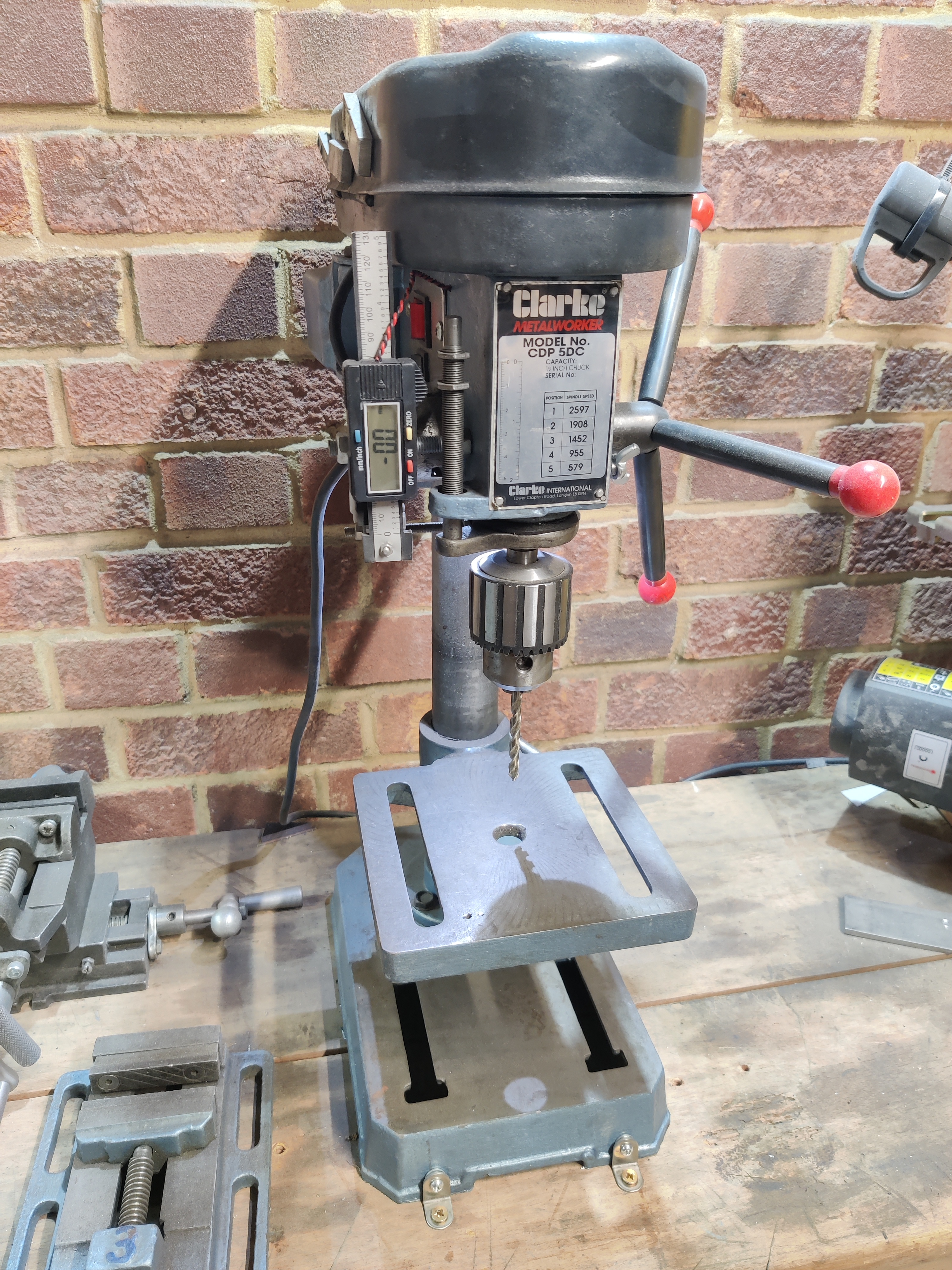 an image of a drill press