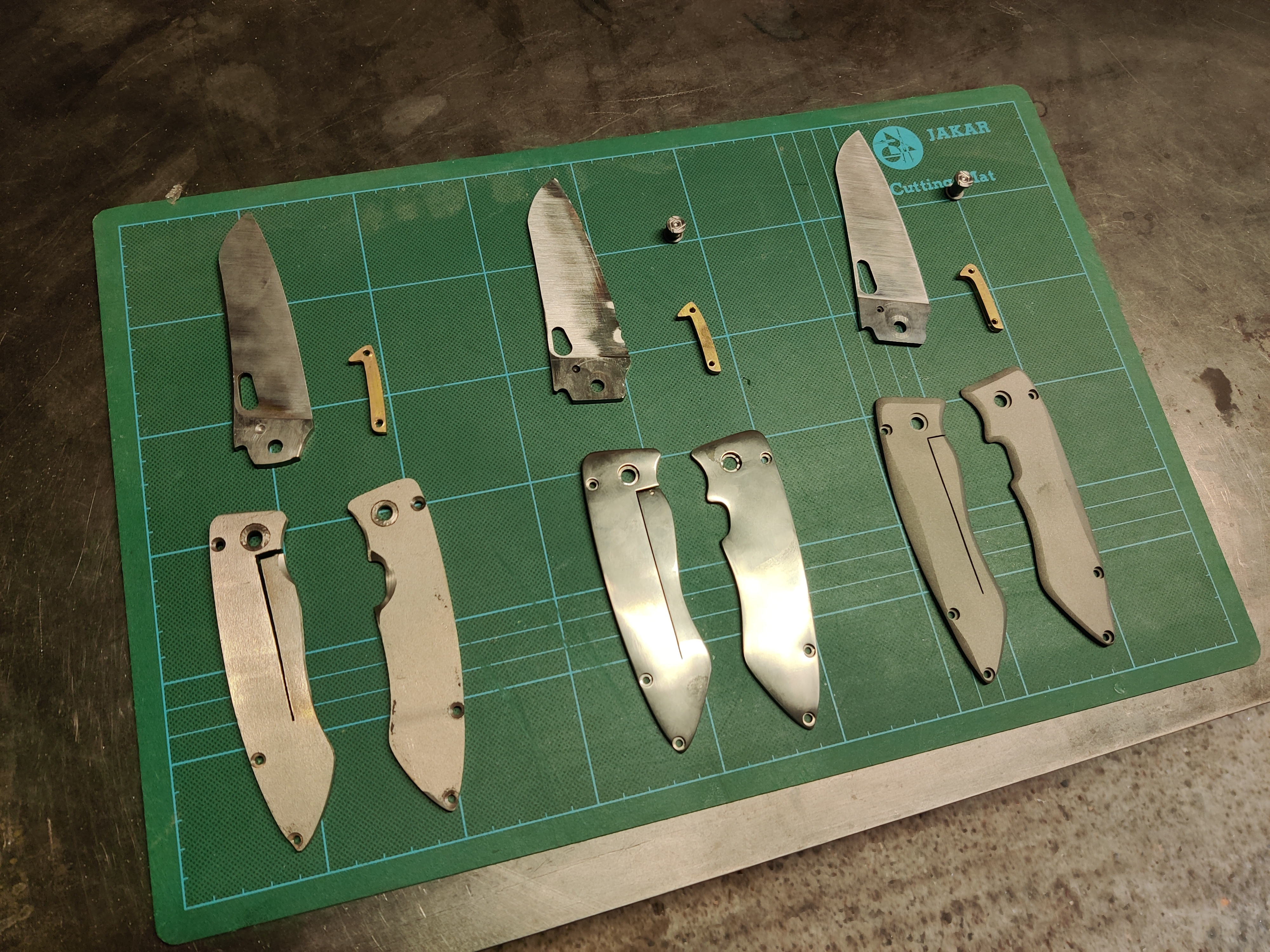 an image of some folding knife prototypes